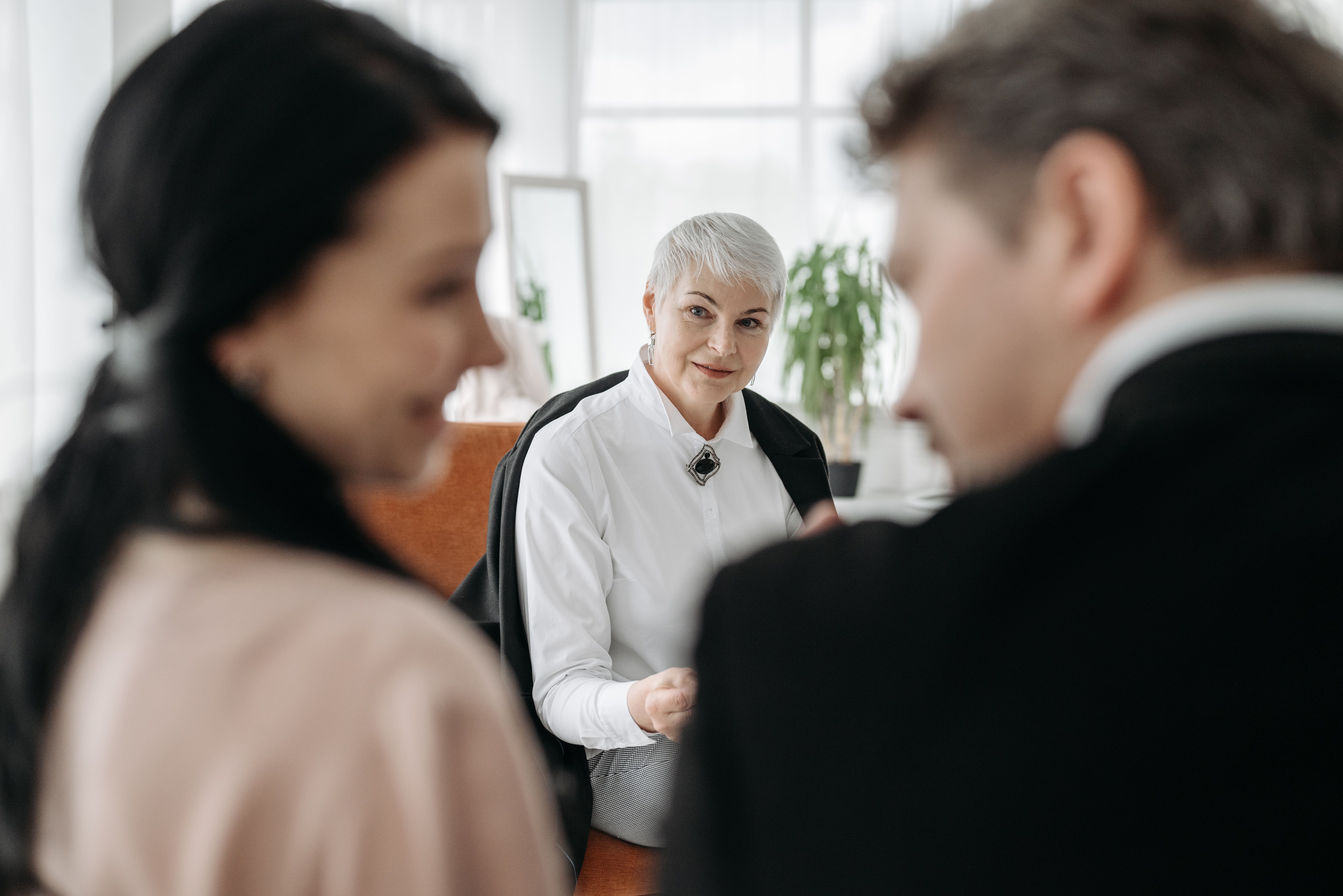 Professional matchmaking consultation session in a modern office